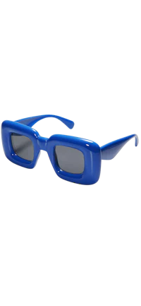 a pair of blue sunglasses on a black background