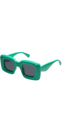a pair of green sunglasses on a black background